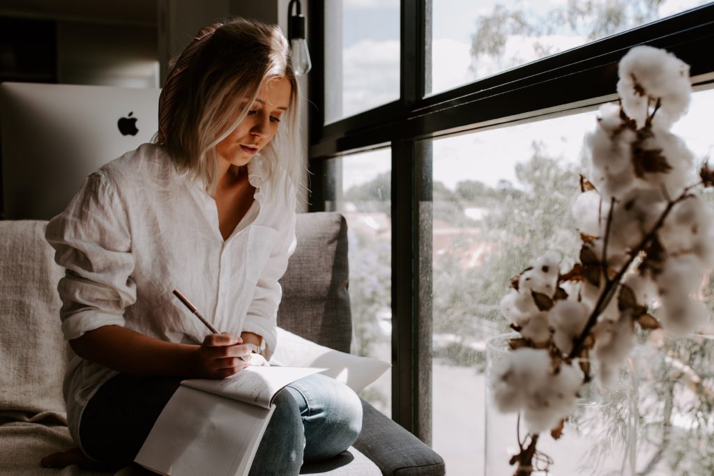 Business owner planning a landing page that converts. Tone and messaging for her business