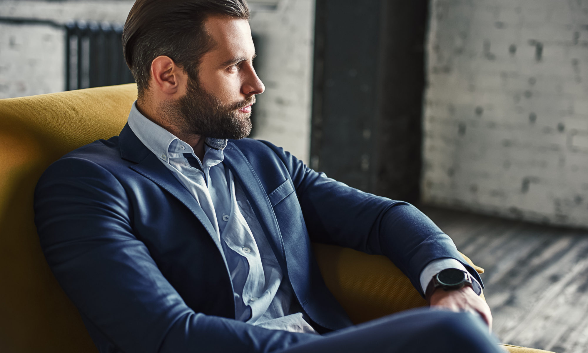 Young and charming businessman is thinking about how can Law Firms Make Their Website Elements More Engaging